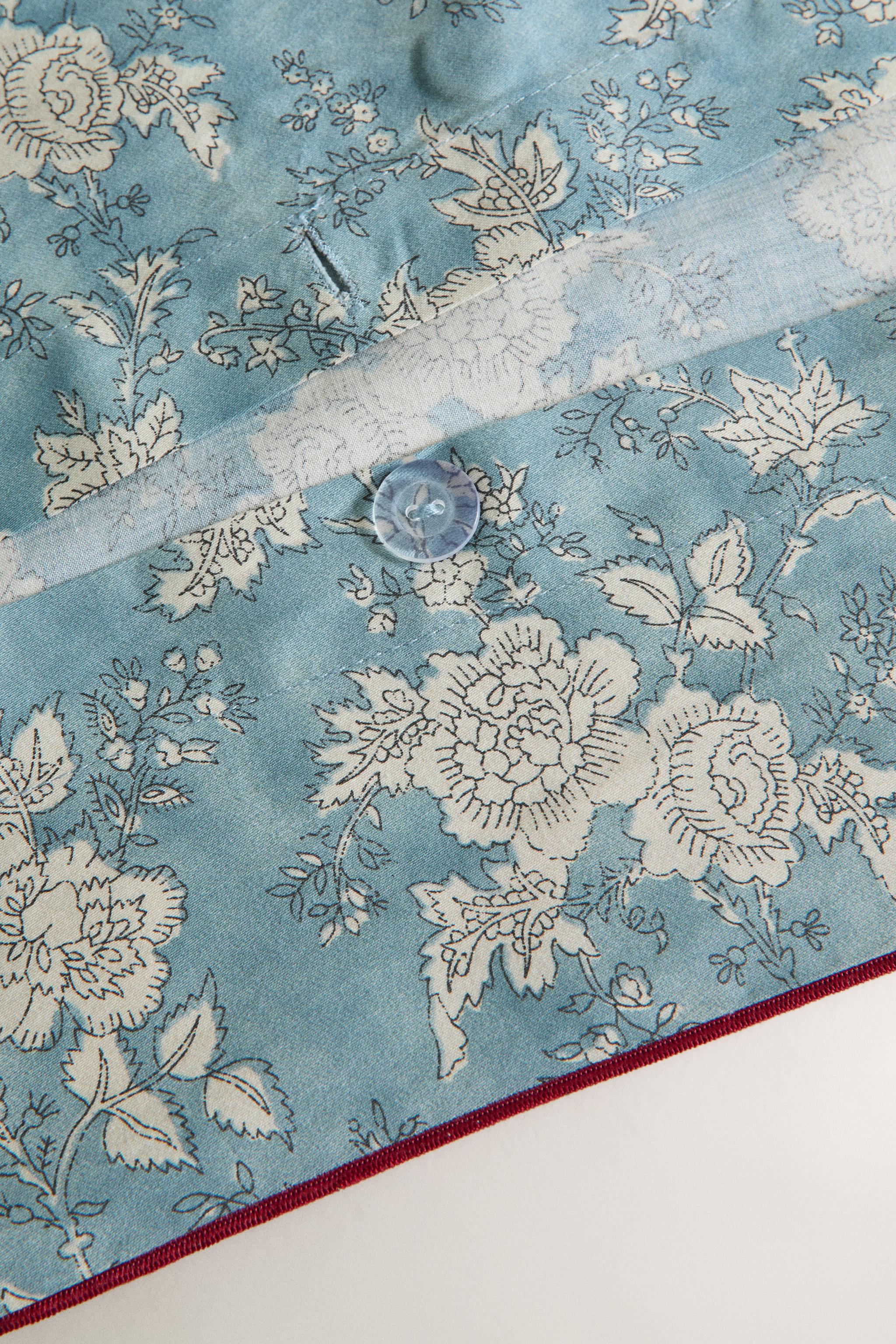 HOUSSE DE COUETTE SATIN FLEURS PASSEPOIL